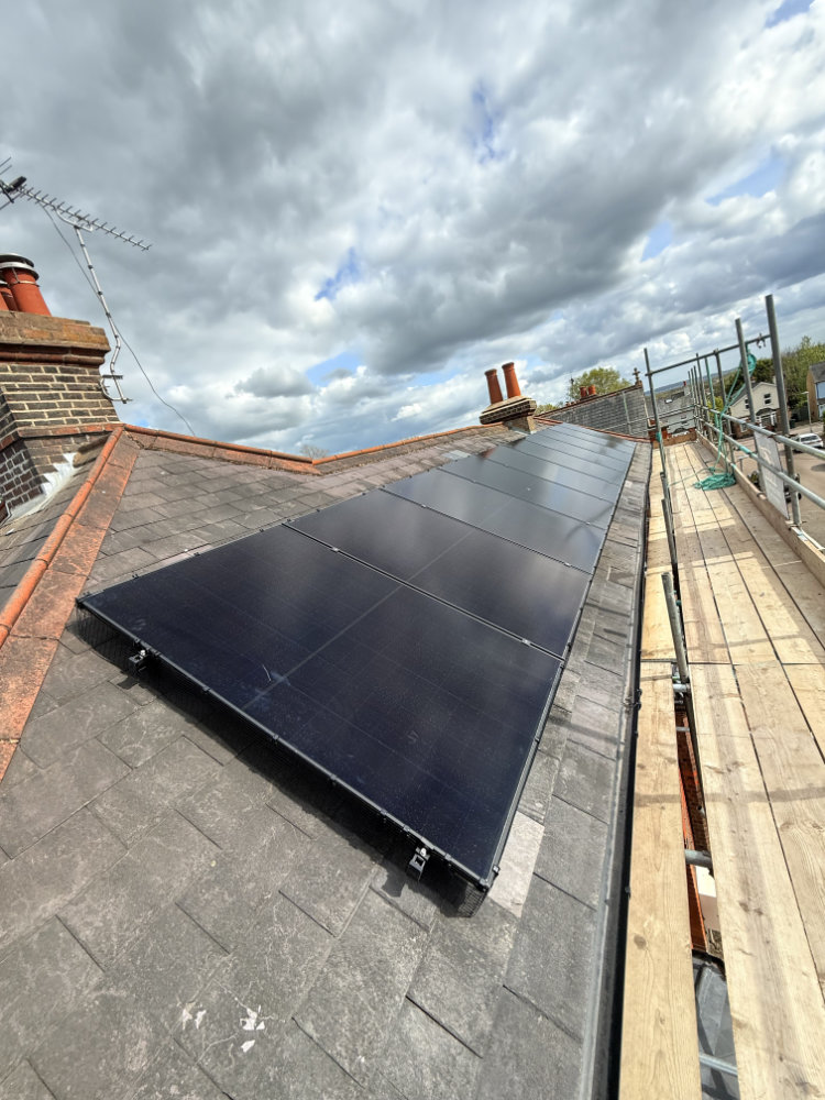 In-roof solar panel edge detail with protection fitted