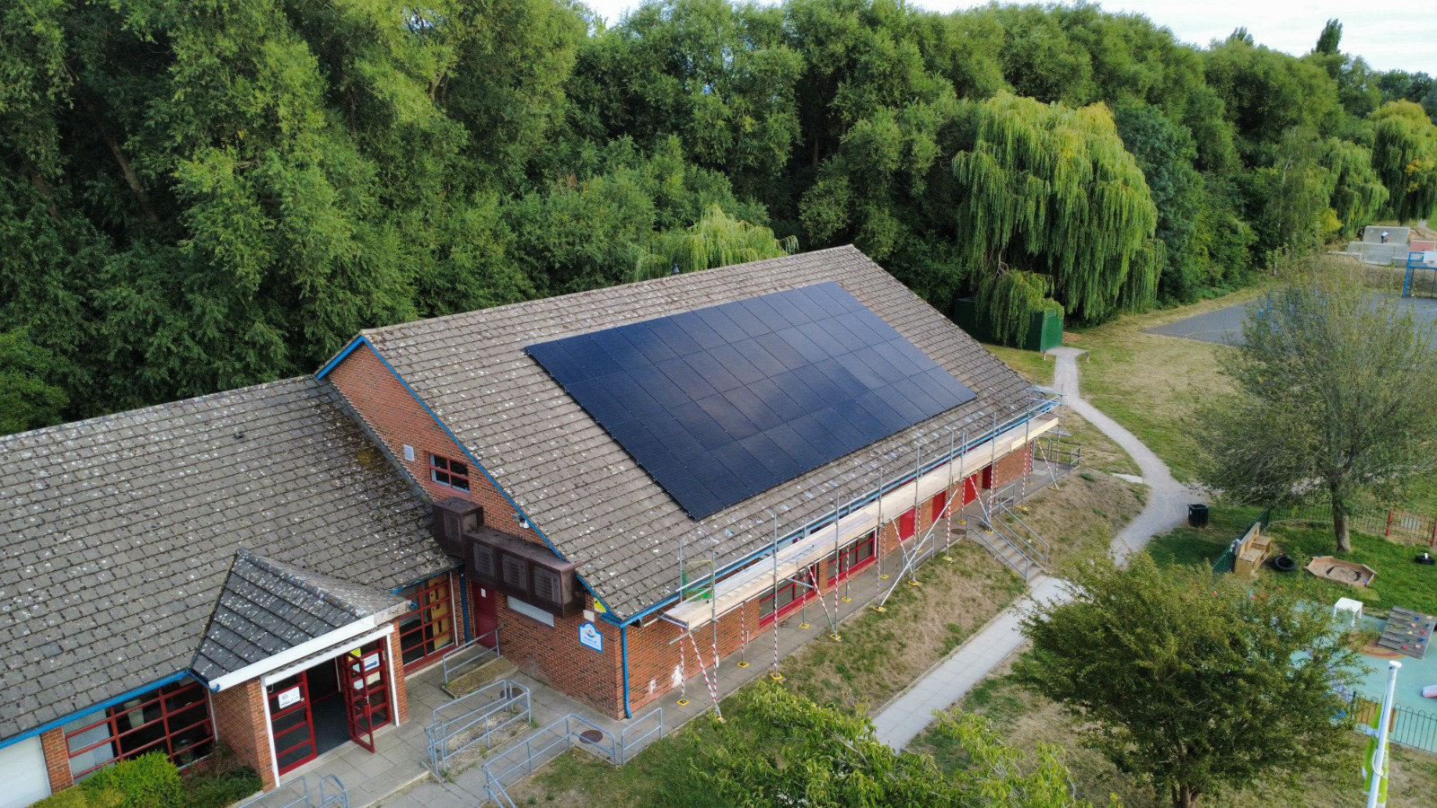 Large solar array on a commercial pitched roof