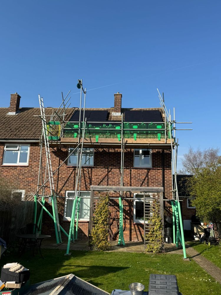 Scaffold and edge protection up for work on an existing solar array